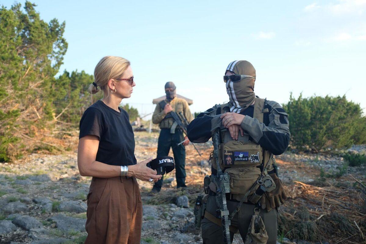 Interviewing armed militia members