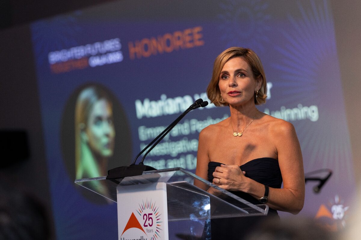 Mariana speaking at awards ceremony
